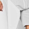 Lightweight summer shorts in a soft, textured fabric. Notice the clean stitching and relaxed fit, perfect for warm weather. C