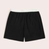 Close-up of athletic shorts, charcoal grey with a subtle textured weave. Notice reinforced stitching & built-in compression l