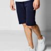 Close-up of soft French Terry gym shorts. Note loopback texture, durable stitching, adjustable drawstring waist. Athletic hea
