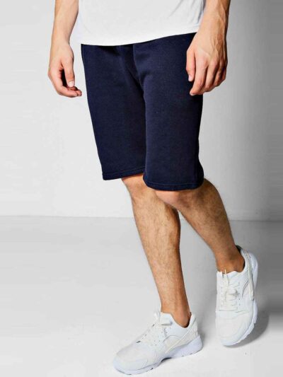 Close-up of soft French Terry gym shorts. Note loopback texture, durable stitching, adjustable drawstring waist. Athletic hea