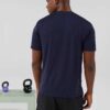 Men's high-end streetwear short set. Textured fabric, subtle stitching, tailored fit. Two-piece design, likely breathable mat