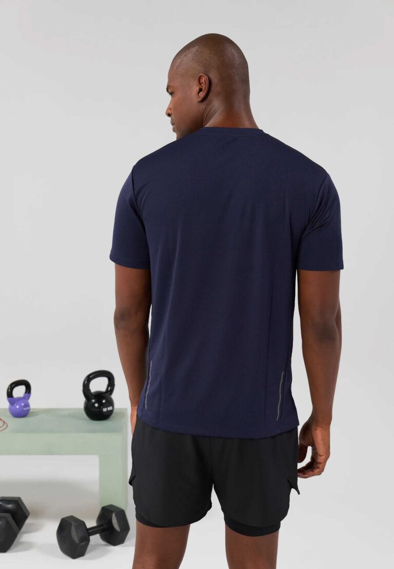Men's high-end streetwear short set. Textured fabric, subtle stitching, tailored fit. Two-piece design, likely breathable mat