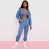 Ladies' athleisure tracksuit set. Gray heather knit, subtle reflective stripes. Cozy, relaxed fit. Fine stitching on jacket &