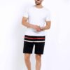 Close-up of custom printed sports shorts. Lightweight, breathable fabric with vibrant design. Quality stitching and comfortab