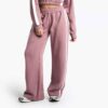 Women's two-piece tracksuit set, likely fleece or terry knit. Custom neck label detail. Athleisure wear, comfy fit, relaxed s