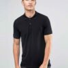 Close-up of a navy polo shirt. Smooth, breathable polyester with fine stitching. Custom logo printed sharply on the chest. -