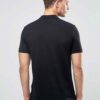 Close-up of a navy polo shirt. Smooth, breathable polyester with fine stitching. Custom logo printed sharply on the chest. -