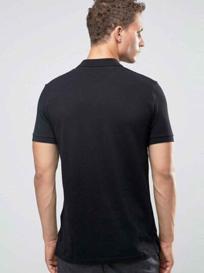 Close-up of a navy polo shirt. Smooth, breathable polyester with fine stitching. Custom logo printed sharply on the chest. -
