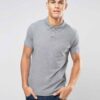 Close-up of a navy polo shirt. Smooth, breathable polyester with fine stitching. Custom logo printed sharply on the chest. -