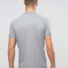 Close-up of a navy polo shirt. Smooth, breathable polyester with fine stitching. Custom logo printed sharply on the chest. -