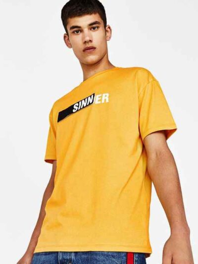 Soft, cotton tee with bold, custom slogan print. Note the clean seams and vibrant color. Lightweight feel, perfect casual wea