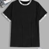 Men's rib-knit ringer t-shirt with a printed graphic. Notice the quality stitching and textured fabric. Comfortable and styli