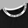 Men's rib-knit ringer t-shirt with a printed graphic. Notice the quality stitching and textured fabric. Comfortable and styli
