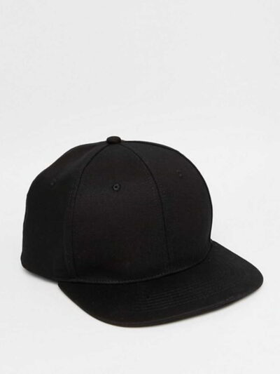 Black snapback cap. Close-up reveals tight stitching, structured crown, and matte texture. Adjustable fit, flat brim, urban s