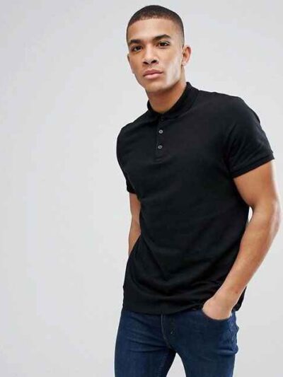 Close-up of a soft cotton polo shirt; subtle pique texture, neat stitching. Perfect casual wear, shown in a light, neutral co