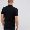 Close-up of a soft cotton polo shirt; subtle pique texture, neat stitching. Perfect casual wear, shown in a light, neutral co
