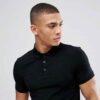 Close-up of a soft cotton polo shirt; subtle pique texture, neat stitching. Perfect casual wear, shown in a light, neutral co