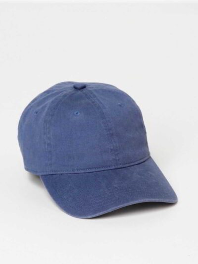Denim navy cap with subtle stitching detail. Adjustable back strap ensures a perfect fit. Classic, casual headwear in sturdy