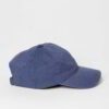 Denim navy cap with subtle stitching detail. Adjustable back strap ensures a perfect fit. Classic, casual headwear in sturdy