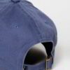 Denim navy cap with subtle stitching detail. Adjustable back strap ensures a perfect fit. Classic, casual headwear in sturdy