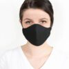Close-up of a triple-layered face mask; soft fabric texture, reinforced stitching; washable reusable facial garment, shows fi
