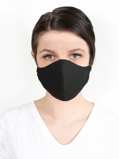 Close-up of a triple-layered face mask; soft fabric texture, reinforced stitching; washable reusable facial garment, shows fi