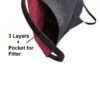 Close-up of a triple-layered face mask; soft fabric texture, reinforced stitching; washable reusable facial garment, shows fi