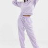 Cozy fleece tracksuit. Half-zip sweat top and basic joggers in a neutral hue. Note the premium stitching and heavy-weight fab