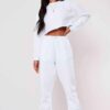 Girls crop sweatsuit, light fabric. Ruff hem, sexy style. Custom, high-quality stitching detail. Perfect streetwear or lounge