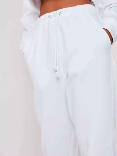 Girls crop sweatsuit, light fabric. Ruff hem, sexy style. Custom, high-quality stitching detail. Perfect streetwear or lounge