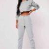 Girls crop sweatsuit, light fabric. Ruff hem, sexy style. Custom, high-quality stitching detail. Perfect streetwear or lounge
