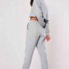 Girls crop sweatsuit, light fabric. Ruff hem, sexy style. Custom, high-quality stitching detail. Perfect streetwear or lounge