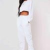 Girls crop sweatsuit, light fabric. Ruff hem, sexy style. Custom, high-quality stitching detail. Perfect streetwear or lounge