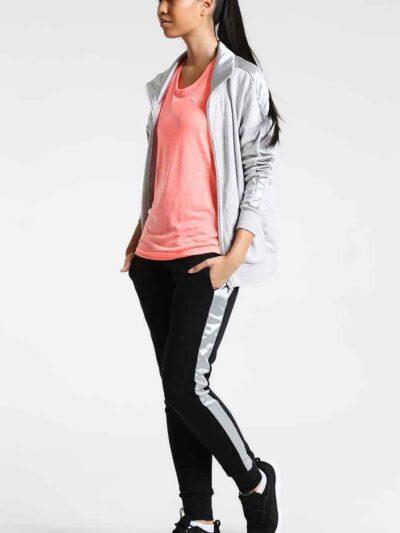 Women's two-piece tracksuit. Zipper hooded top, matching pants. Soft-look fabric, subtle stitching detail. Casual athletic we