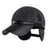Ear flap baseball cap: PU leather visor, woolen striped panels. Folded ear flaps show stitching. Unisex style, warm fabric. -