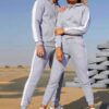 Crop hoodie tracksuit: contrast panels highlight the sporty silhouette. Soft, brushed fleece texture; neat stitching. Activew