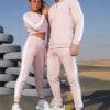 Crop hoodie tracksuit: contrast panels highlight the sporty silhouette. Soft, brushed fleece texture; neat stitching. Activew