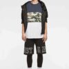 Men's short-sleeve shirt. Textured fabric, visible stitching. Casual style, custom print area, dark gray with light accents.