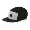 Black skull cap for motorcycle riders, hook and loop badge area on front. Breathable material, clean stitching detail. - View