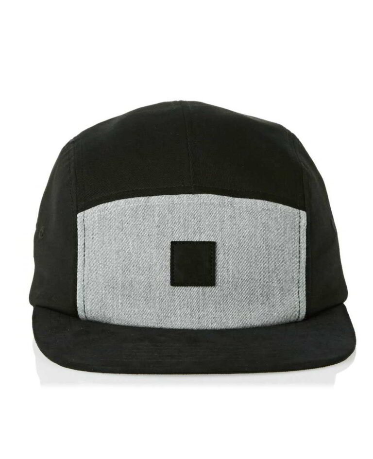 Black skull cap for motorcycle riders, hook and loop badge area on front. Breathable material, clean stitching detail. - View