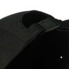 Black skull cap for motorcycle riders, hook and loop badge area on front. Breathable material, clean stitching detail. - View