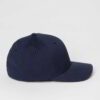 Washed cotton baseball cap, relaxed fit. Notice the soft texture, distressed details, and tonal stitching. Adjustable back cl