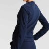 Ladies' vibrant two-piece tracksuit. Soft, stretchy fabric, maybe fleece. Figure-hugging fit, athletic-inspired stitching det