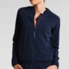 Ladies' vibrant two-piece tracksuit. Soft, stretchy fabric, maybe fleece. Figure-hugging fit, athletic-inspired stitching det