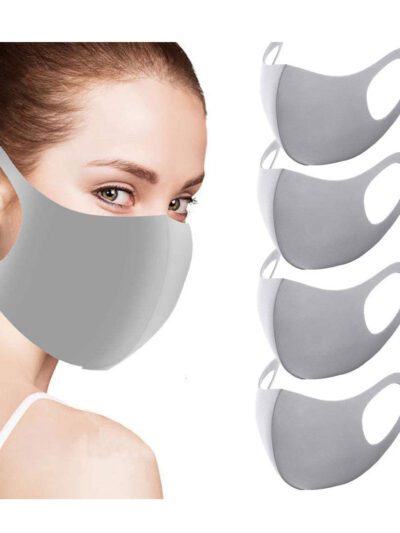 Grey fabric face covering with neat stitching, breathable material. Reusable dust barrier mask for adults, comfortable fit.