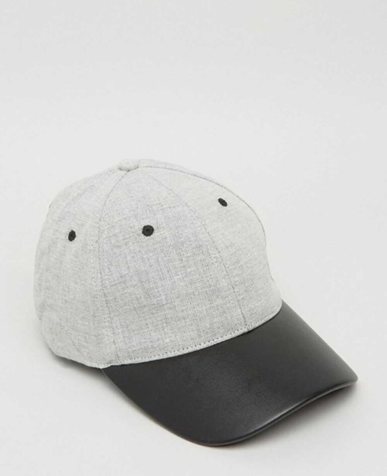 Khaki fishing hat with sturdy chin strap. Waterproof, breathable fabric shows fine stitching and adjustable toggles. Protect