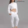 White cotton girls' sweatsuit. Soft, looped interior. Ribbed cuffs & hem. Comfortable fit, visible stitching detail. Sporty &