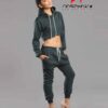 White cotton girls' sweatsuit. Soft, looped interior. Ribbed cuffs & hem. Comfortable fit, visible stitching detail. Sporty &