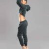 White cotton girls' sweatsuit. Soft, looped interior. Ribbed cuffs & hem. Comfortable fit, visible stitching detail. Sporty &