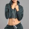 White cotton girls' sweatsuit. Soft, looped interior. Ribbed cuffs & hem. Comfortable fit, visible stitching detail. Sporty &